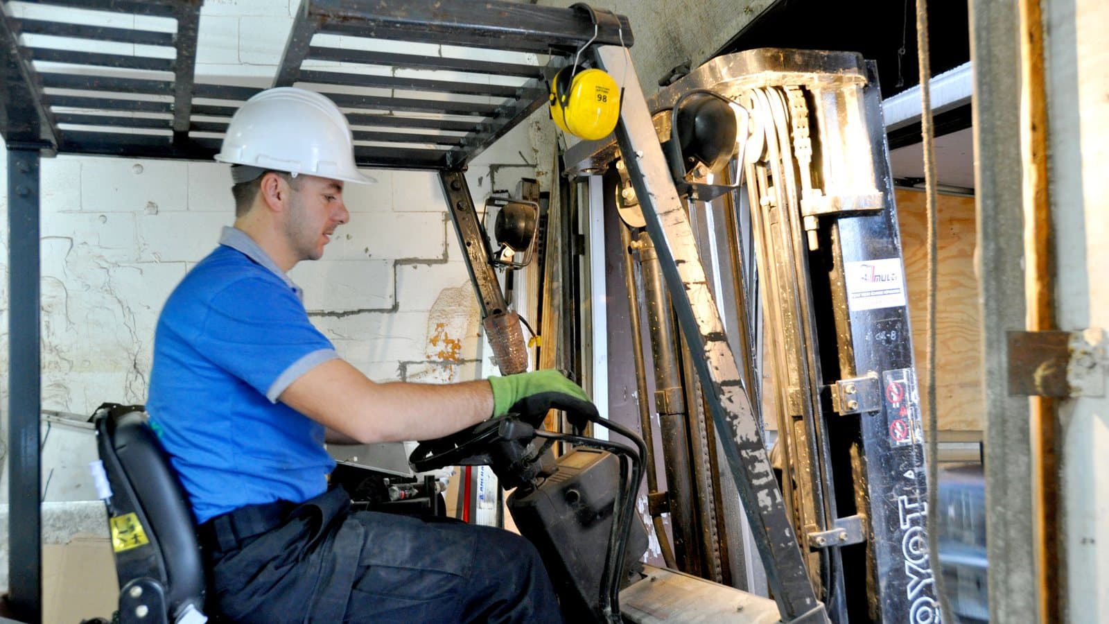 SunTech Recycle operator moving retired IT equipment under a documented chain of custody